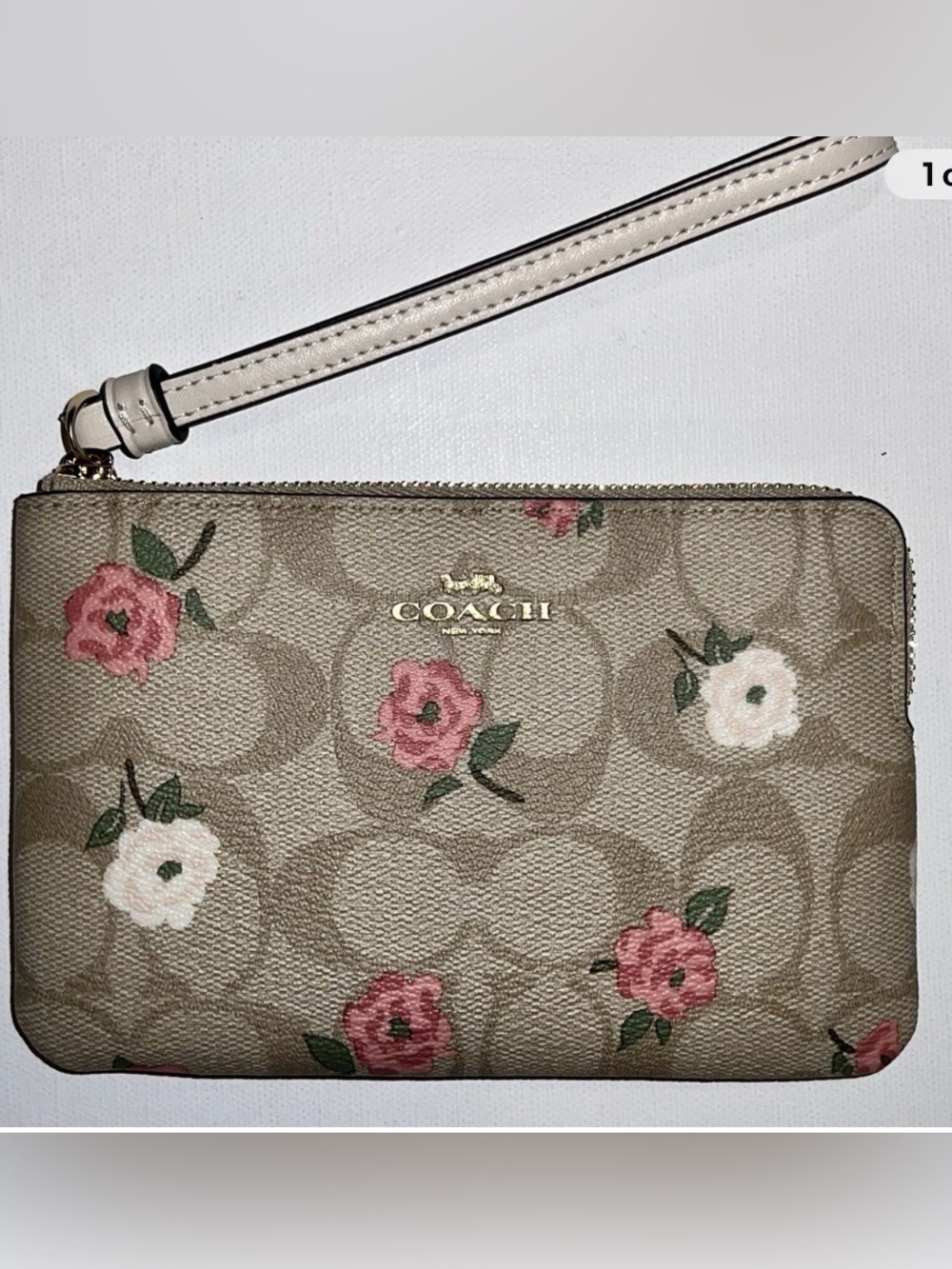 Coach Corner Zip Wristlet in Signature Canvas with Heart Floral Print.